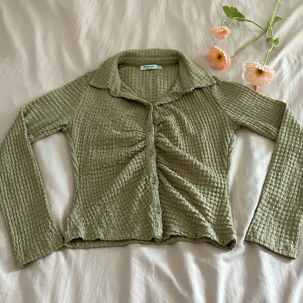 Trendy, office-siren blouse.